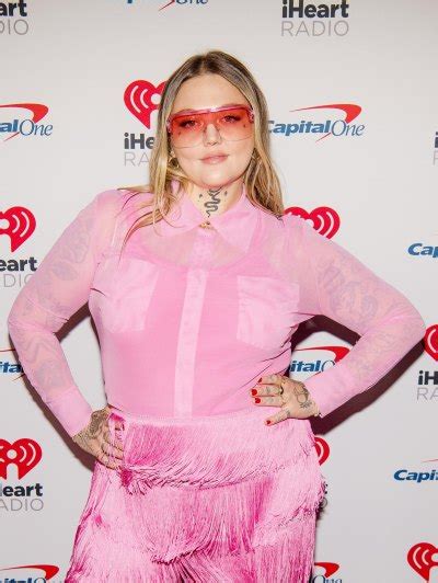 Elle King gets butt tattoo for men helping her raise son after Dan .